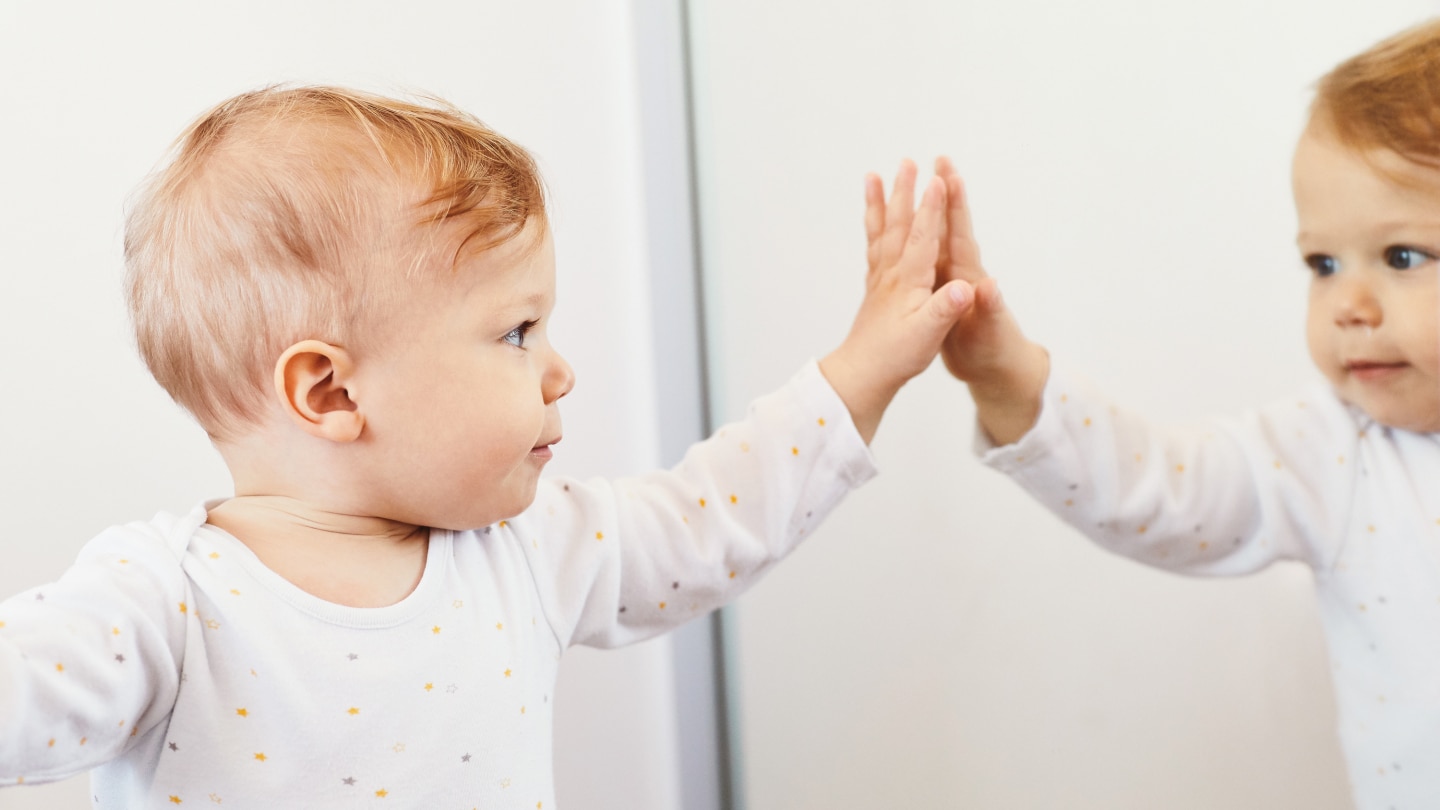 child baby boy playing childhood toy toddler cute fun little mirror reflection